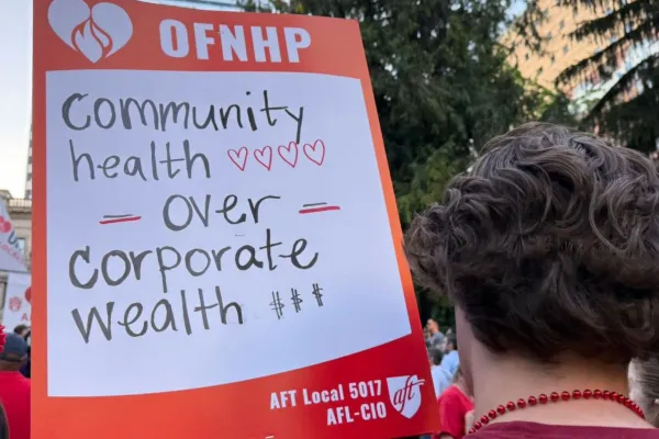 A picket sign at an OFNHP demonstration